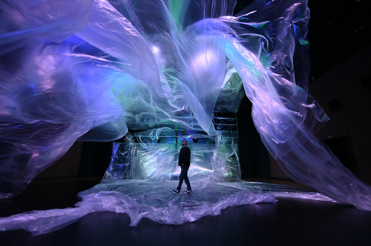Artist Sakchin Bessette with his immersive art installation, Whispers