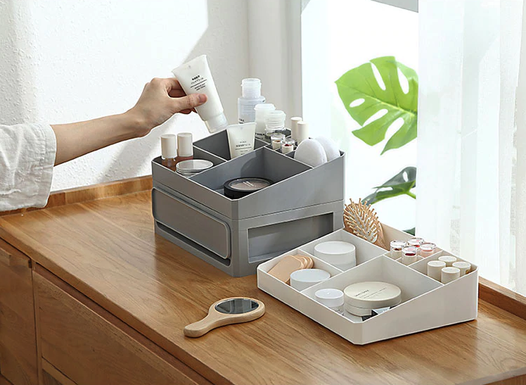 Baffect pink makeup organiser with four drawers and a top box with compartments for lipsticks and other makeup products