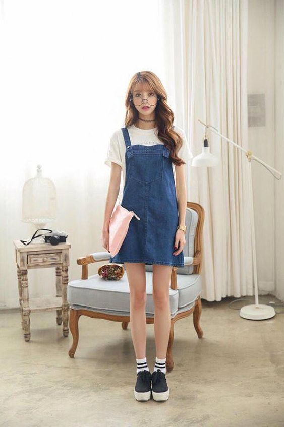 Girl in blue overalls