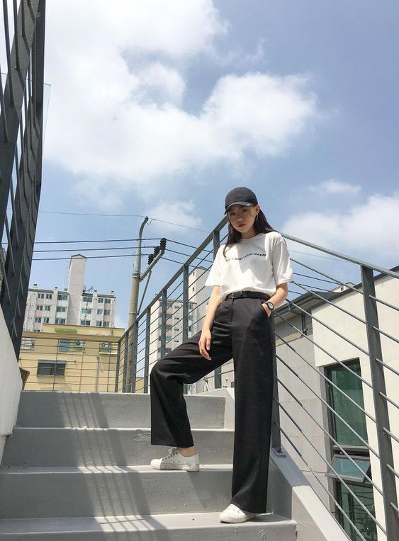 Girl standing on stairs