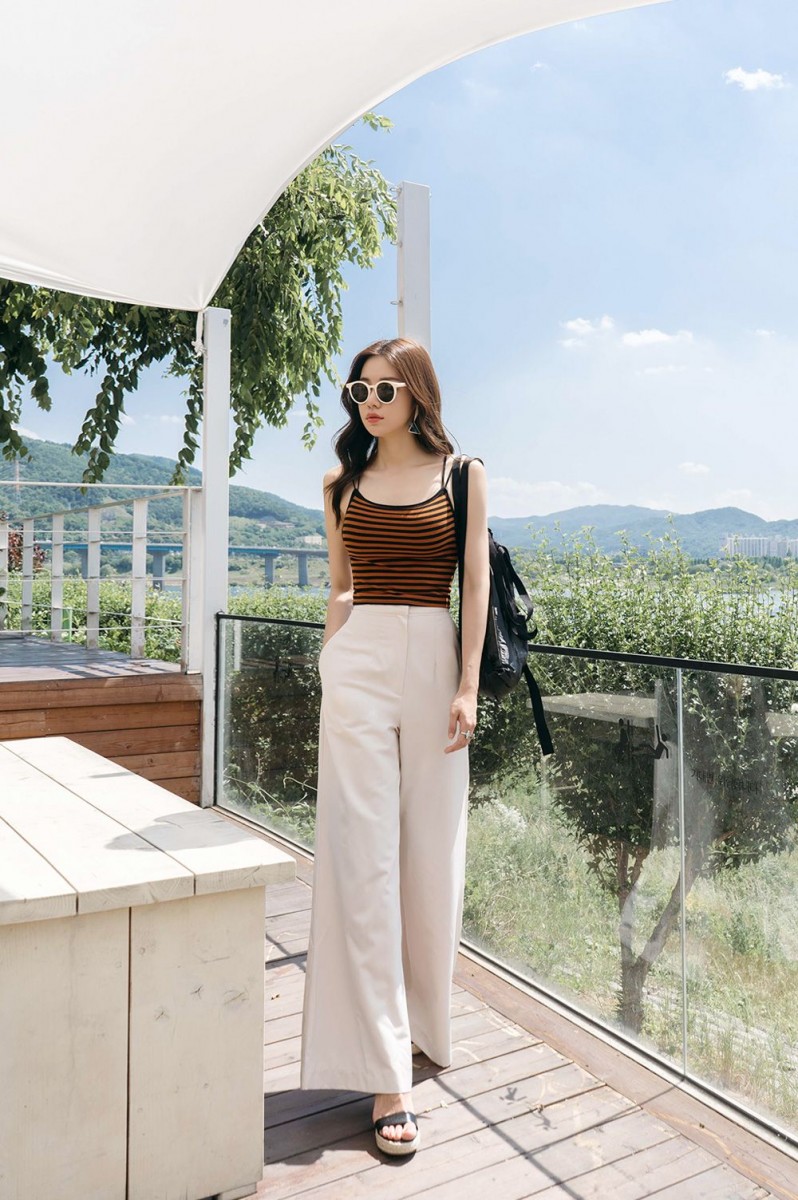 brown top beige flared pants