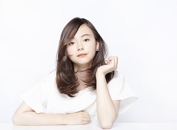 asian girl with a mid-length blunt haircut and bangs