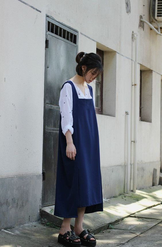 asian woman wearing Long dress with chunky shoes