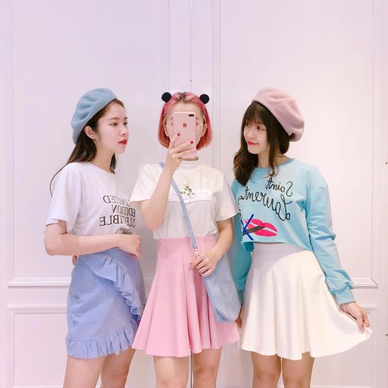 3 girls in pastel clothes