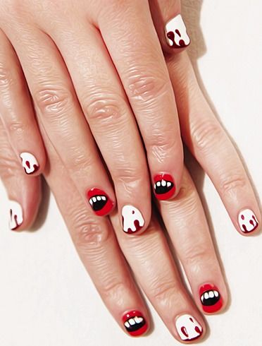 halloween nails with vampire mouth and fangs