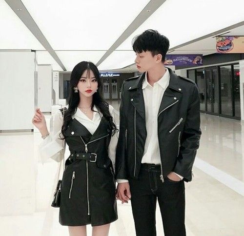 Couple wearing leather couple outfit together