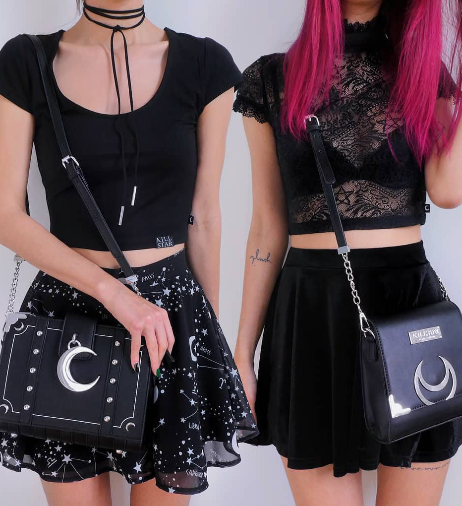  two girls wearing a crop top and miniskirt with a sling bag and one of them is wearing the Milky Way Chiffon Skirt 