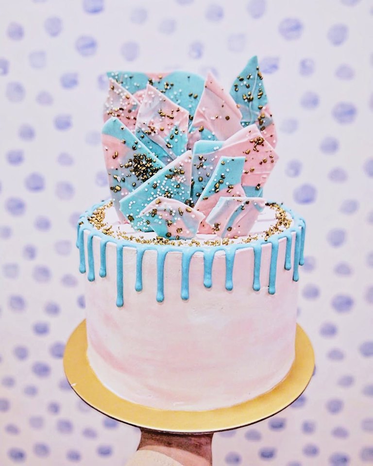 Spatula Whimsical Series cakes with candy coloured geometric decorations
