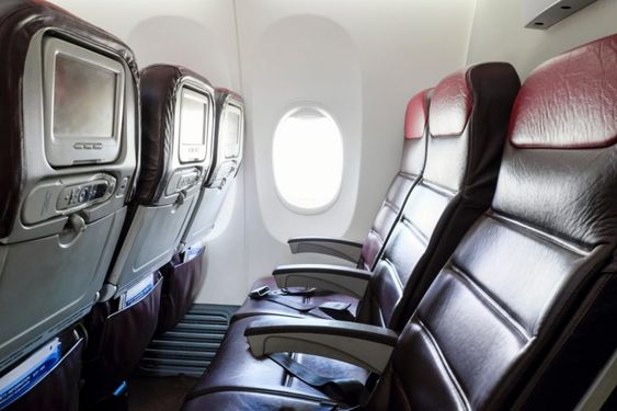 empty row of economy flight seats