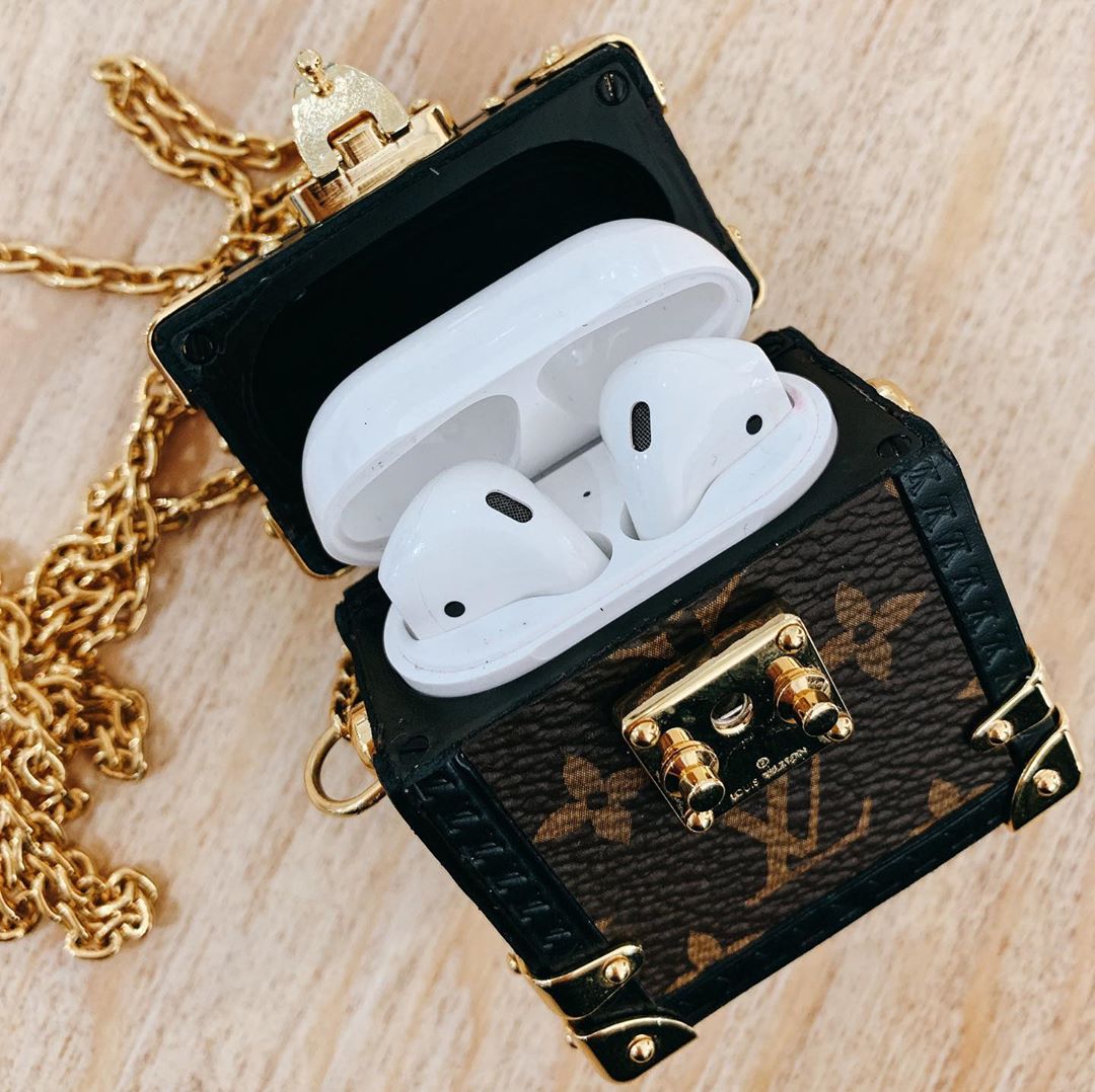 Louis Vuitton airpods case with the top opened