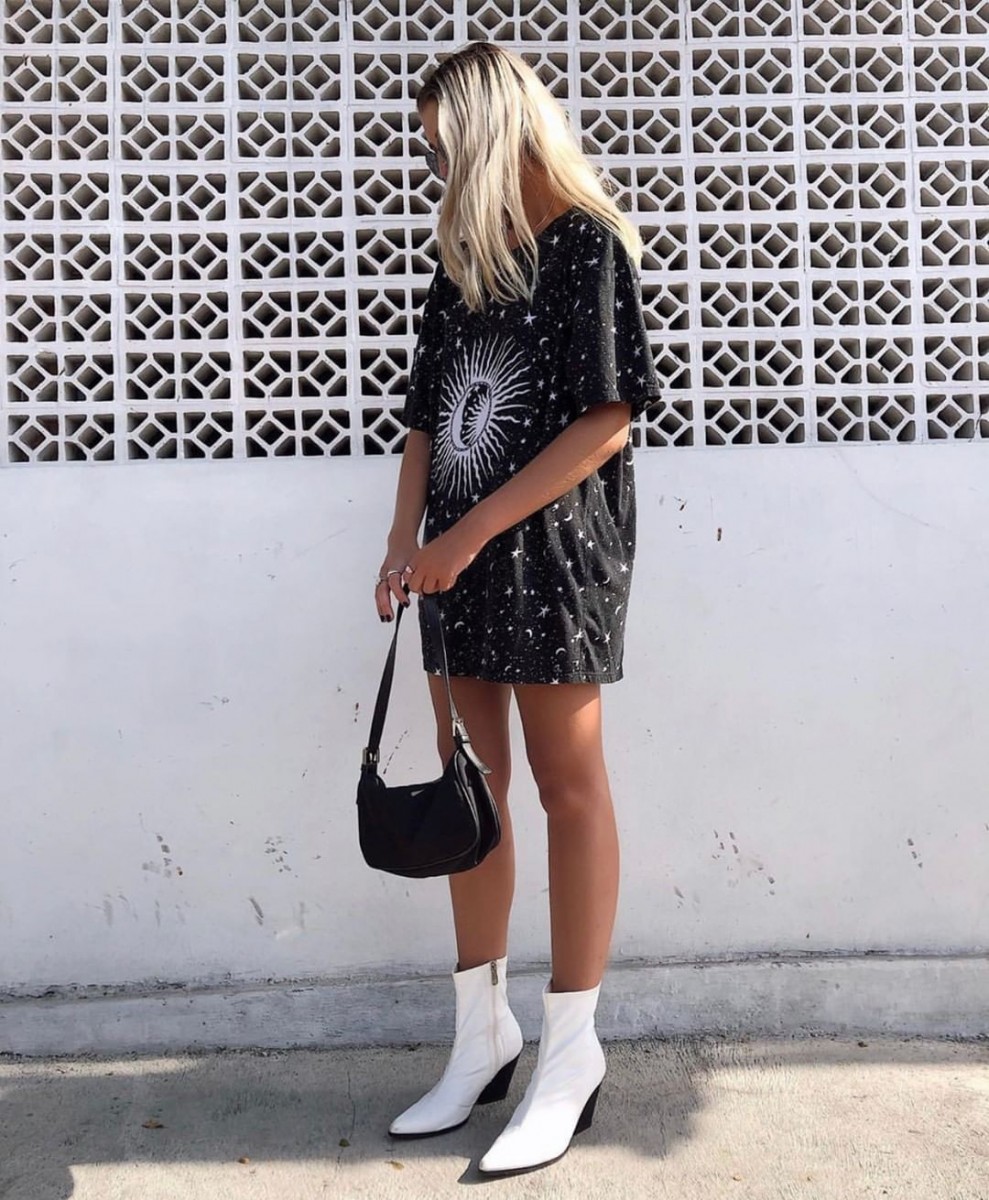 girl wearing Sunny Kiss Oversized Tee in Black Cosmos and white boots