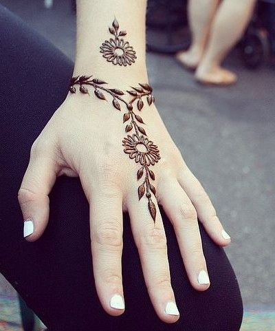 floral henna tattoo design on hands
