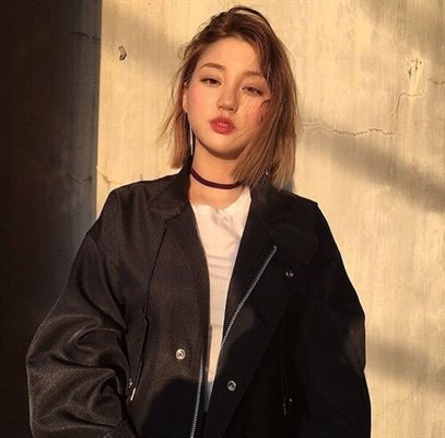 Girl in black bomber jacket