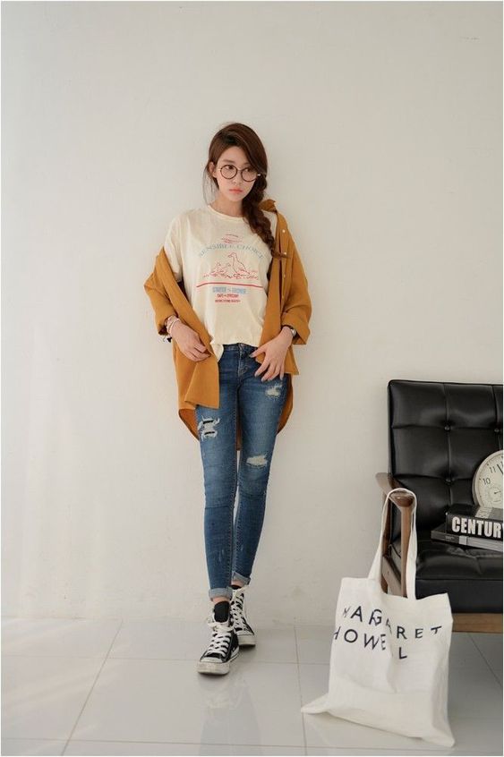 Girl in mustard cardigan