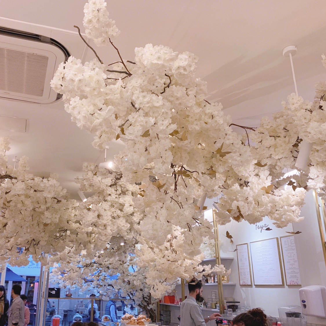 Flowers hanging from the ceiling in FEYA