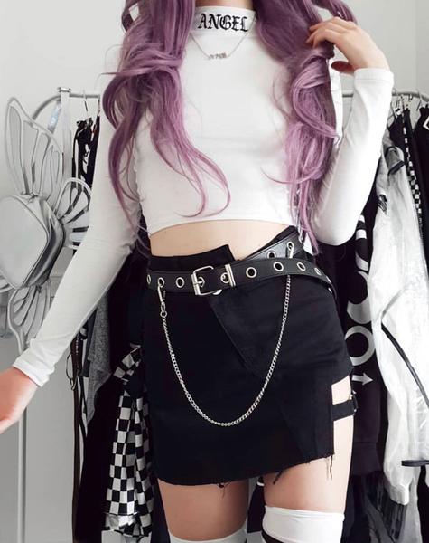 girl wearing Lara Crop in White with Angel Embro and a black mini skirt