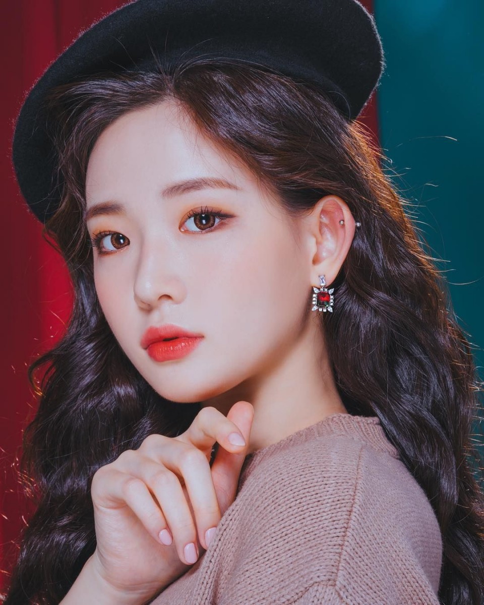 girl in black beret and earrings