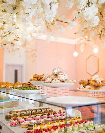 Interior of FEYA with shot of desserts and pastries