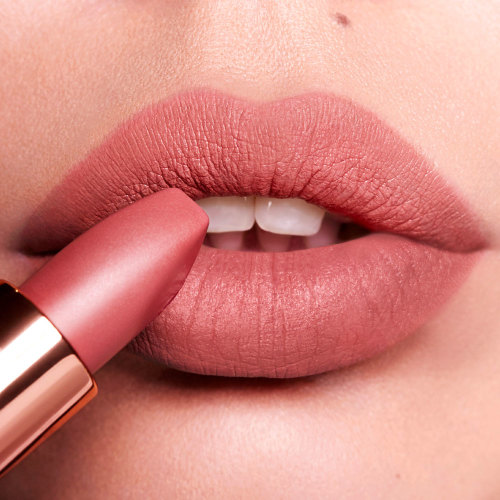 Charlotte Tilbury lipstick in pillow talk on the lips