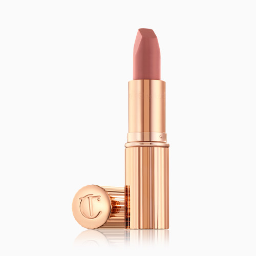 Charlotte Tilbury lipstick in pillow talk with glamorous gold packaging