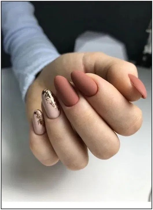 orange nude nails with gold