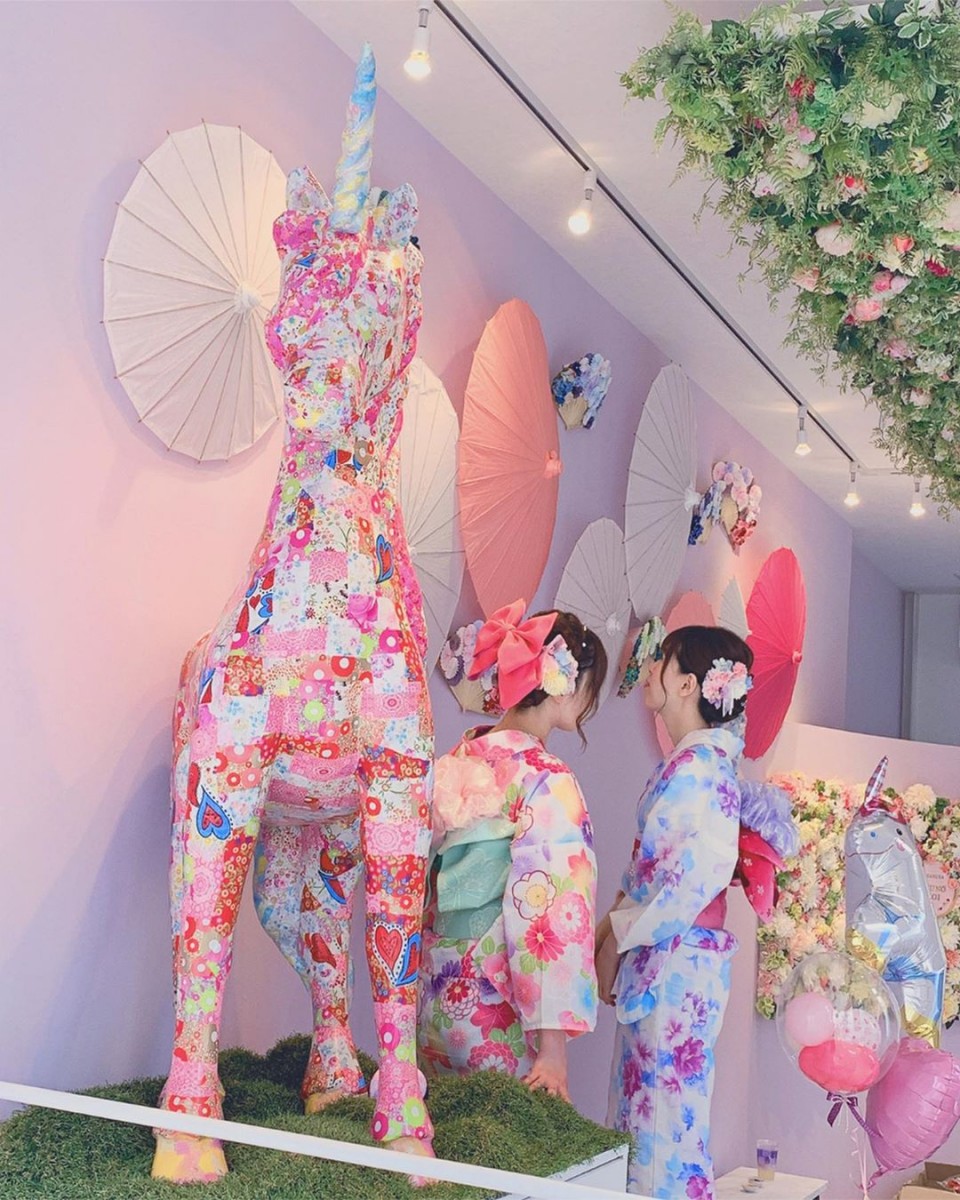 giant pink unicorn at the entrance of the Asakusa Tsuno Koi store