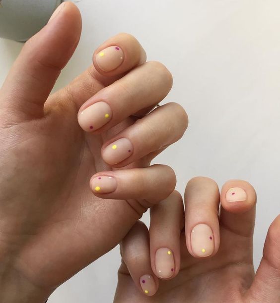 nude nails with gold spots