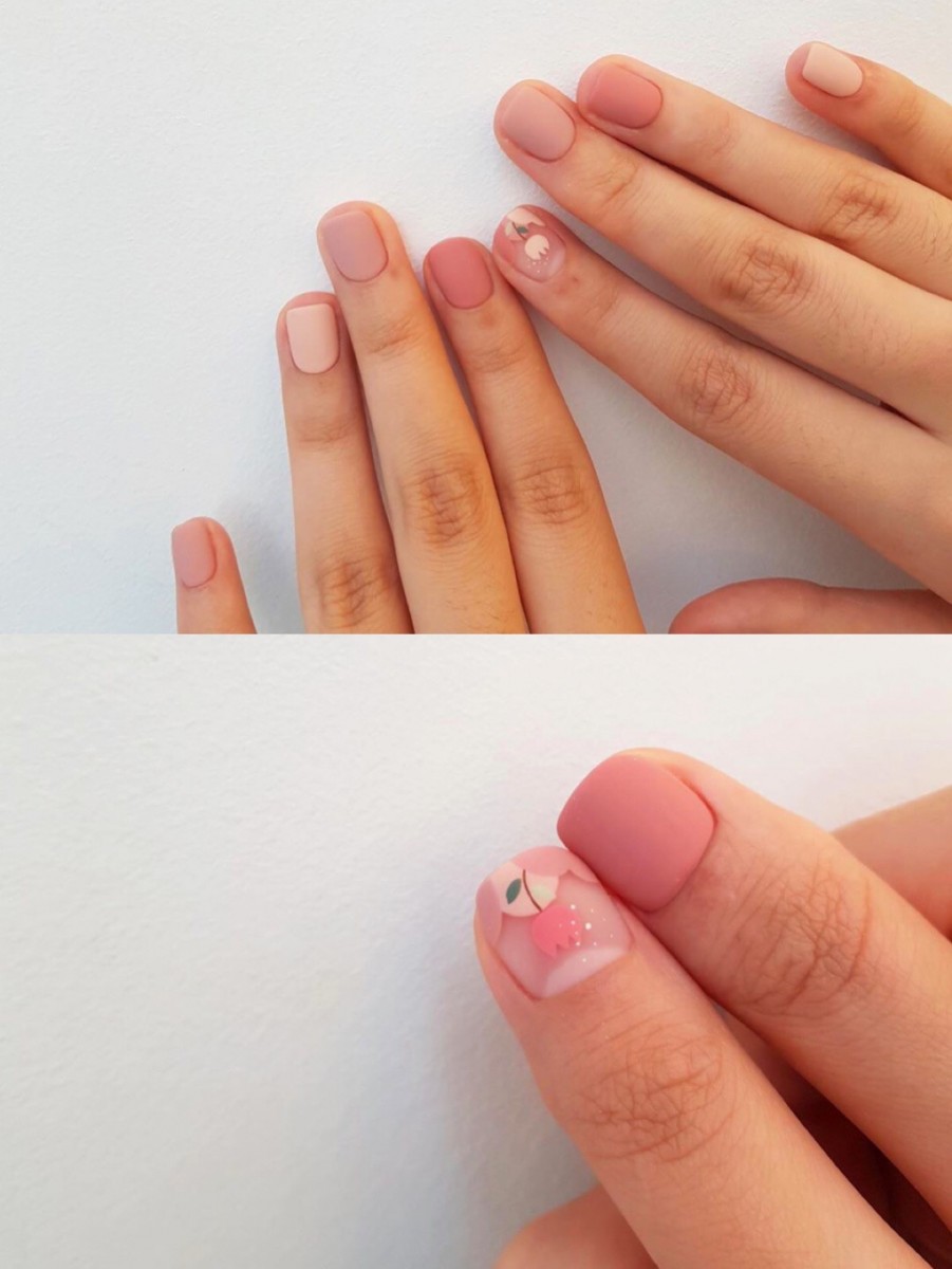 Nude pink matte nails with flower design