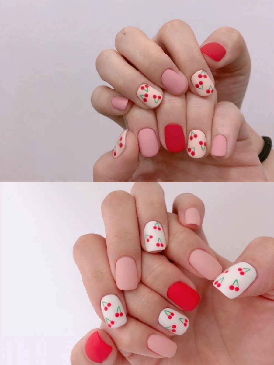 Red and pink matte nails with cherry design