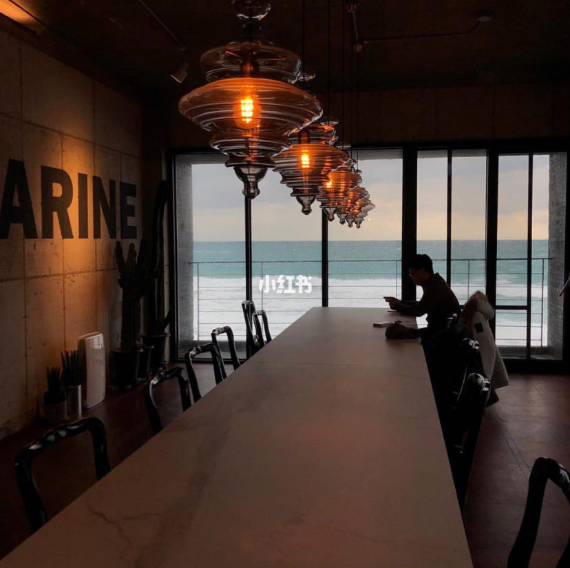 Guy sitting alone in Ultra Marine cafe