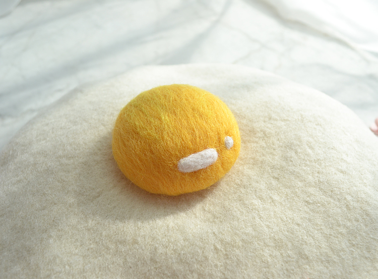 Fried egg hat close up on egg yolk