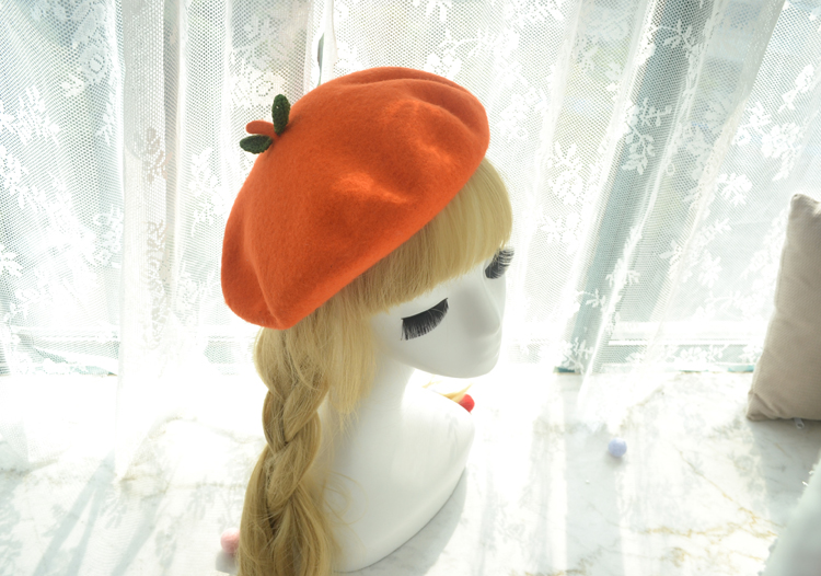 Orange hat worn on wig