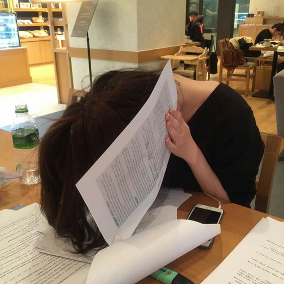 asian girl sleeping at the desk