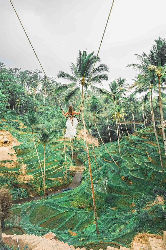 girl on a swing in Bali, Indonesia