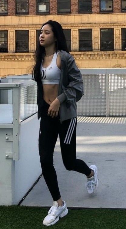 Sports bra and leggings with green jacket