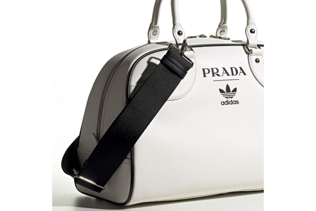 Side view of the prada x adidas bag with sling