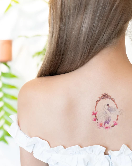 Watercolour tattoo on the back