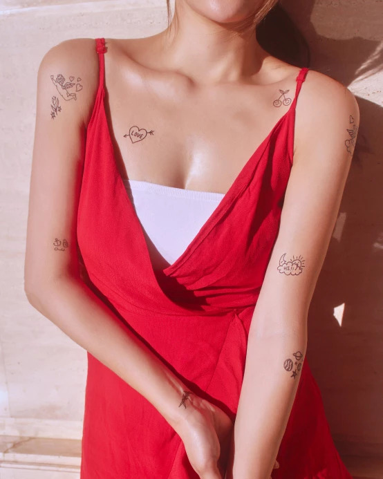 Model with minimalist tattoos