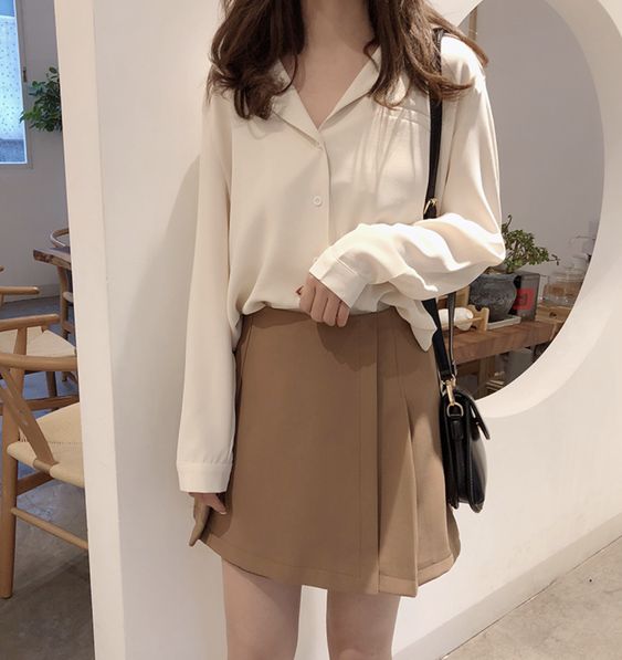 white blouse brown skirt