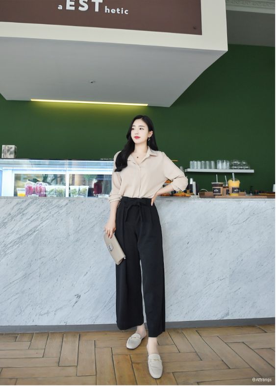 khaki top black pants