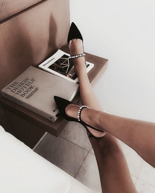 black heels in hotel room