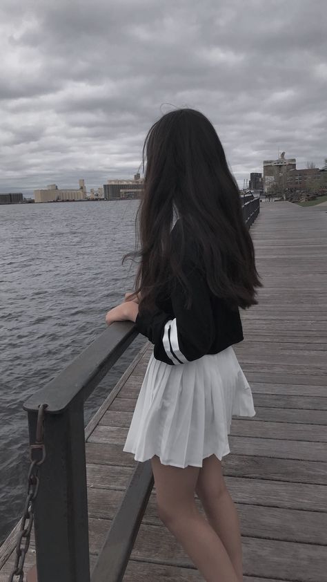 Girl looking out to the sea