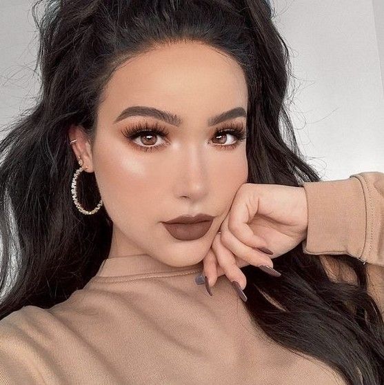 Asian woman wearing dark lipstick