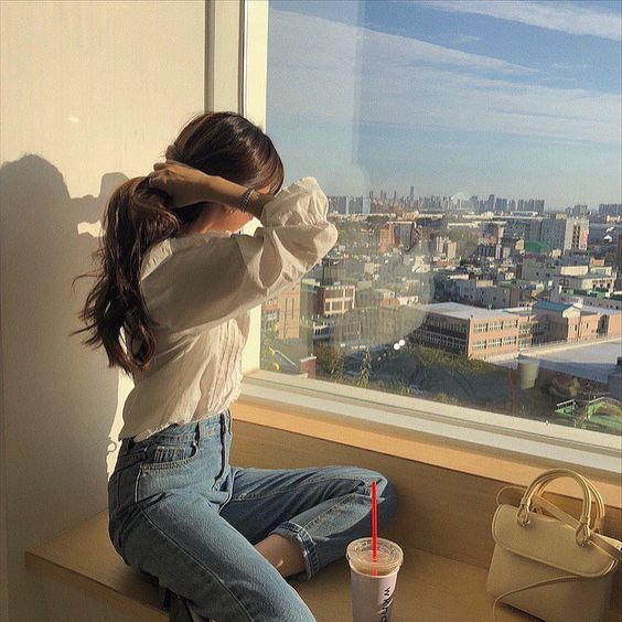 Girl looking out a window