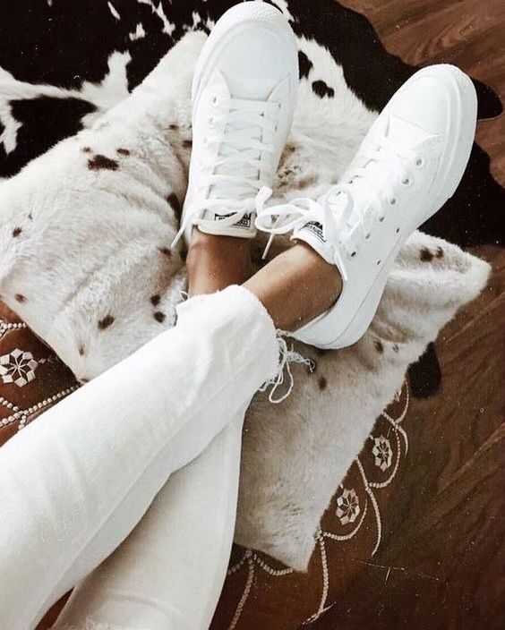 white shoes on cushion