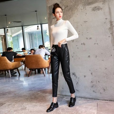 leather trousers and white top