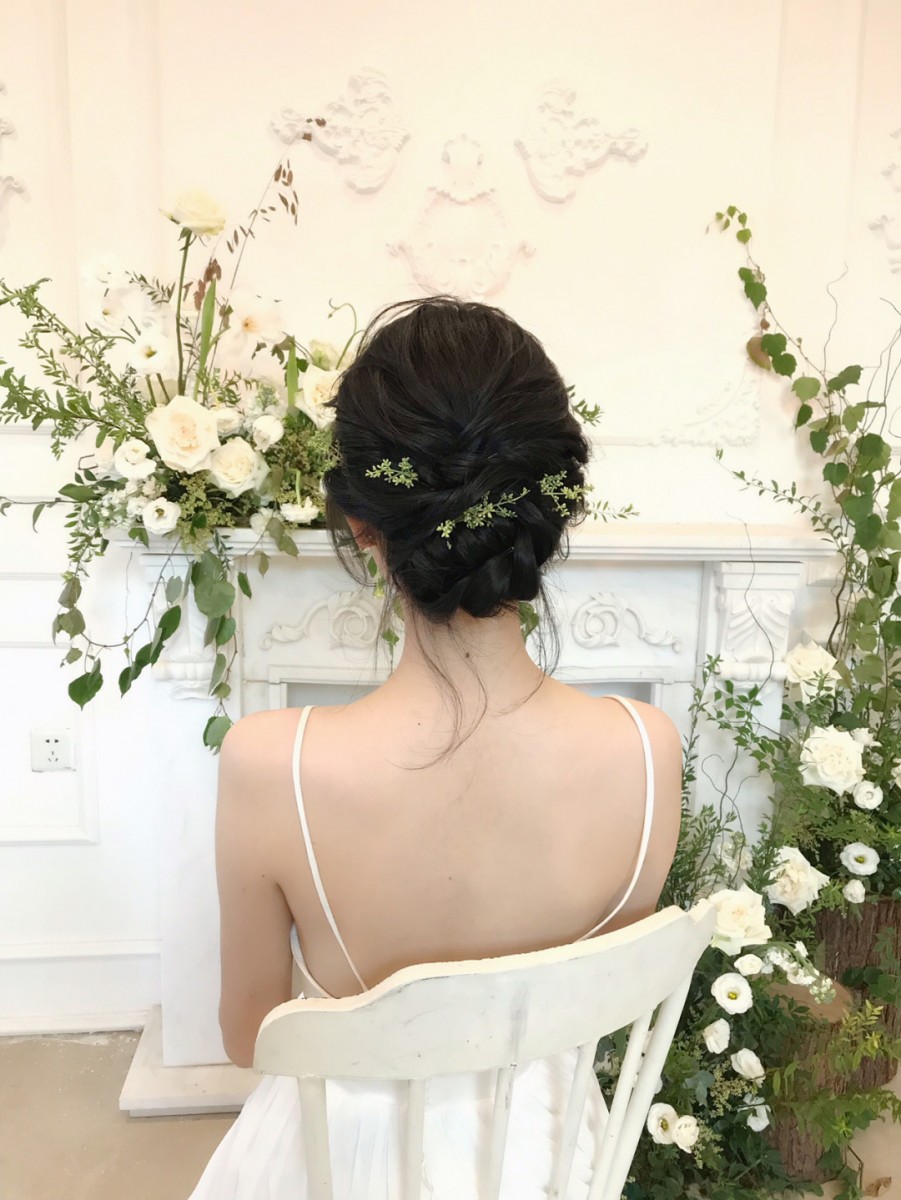 Back view of hairstyle with leaves