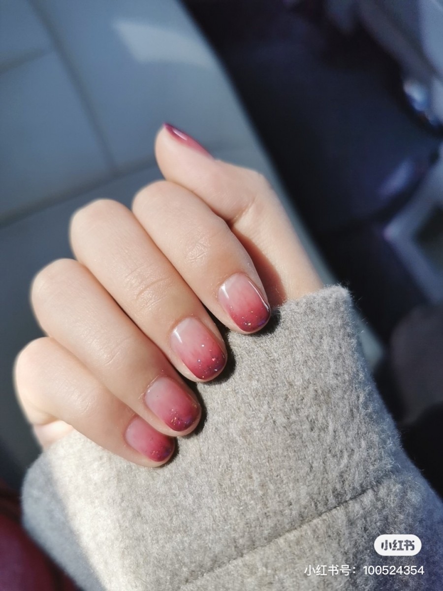 Red glittery ombre nails