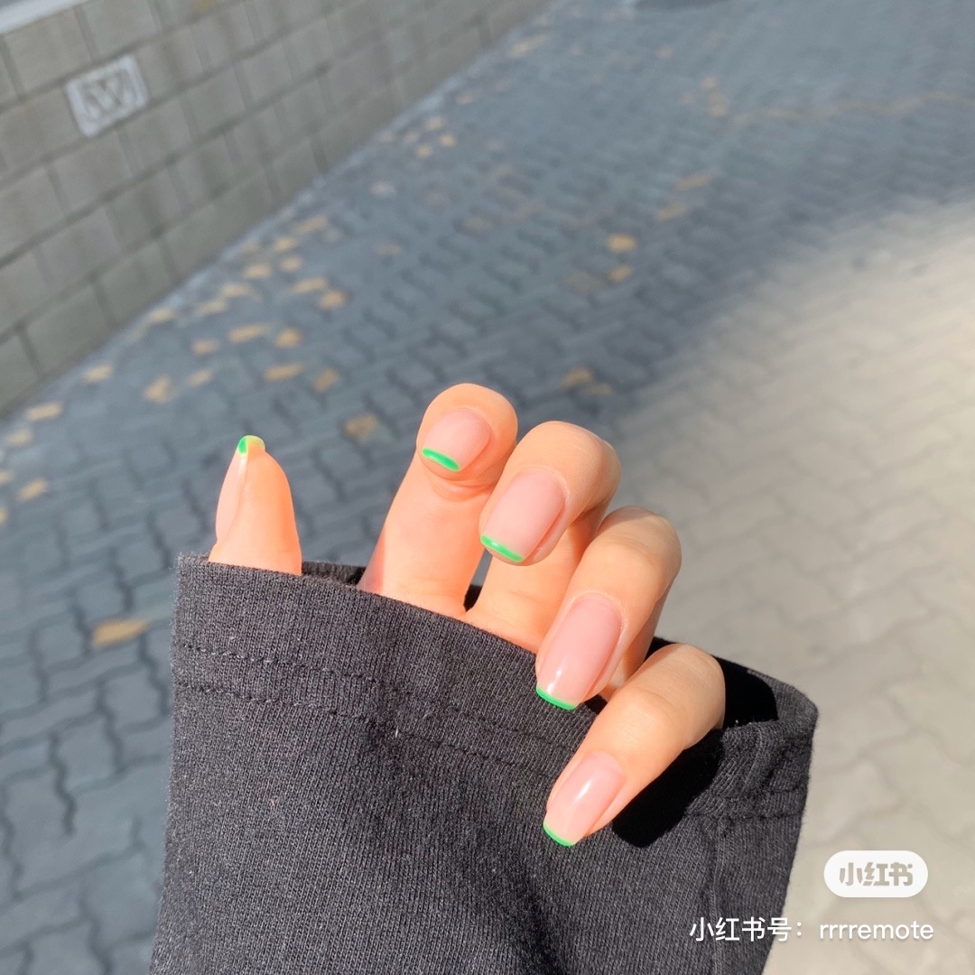 Nude pink and neon green tips