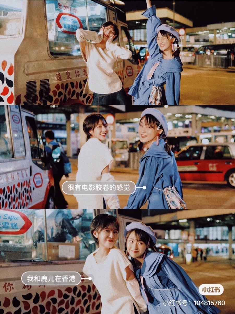 Two girls posing near the street